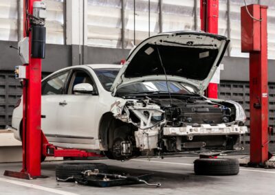 closeup car in repair station and body shop with soft-focus and over light in the background